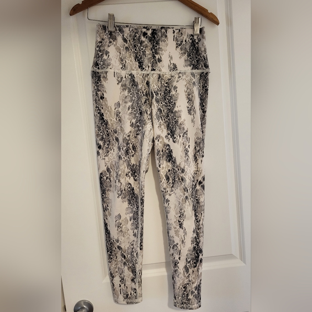Evolution and Creation Black and White Leggings with Snakeskin Print